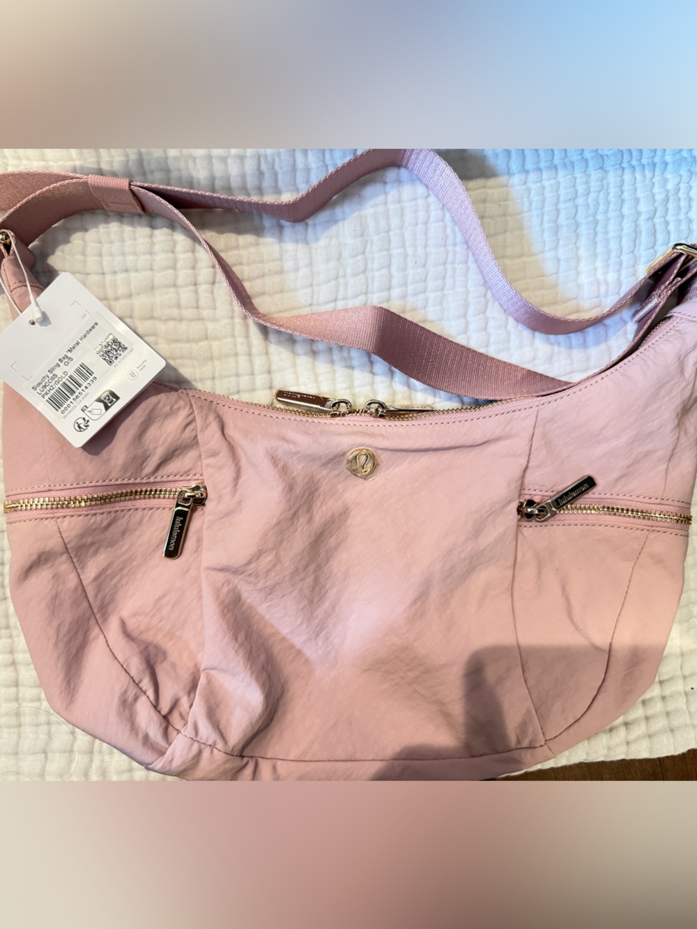 Lululemon Slouchy Sling Bag pink haze with golden hardware New With Tags